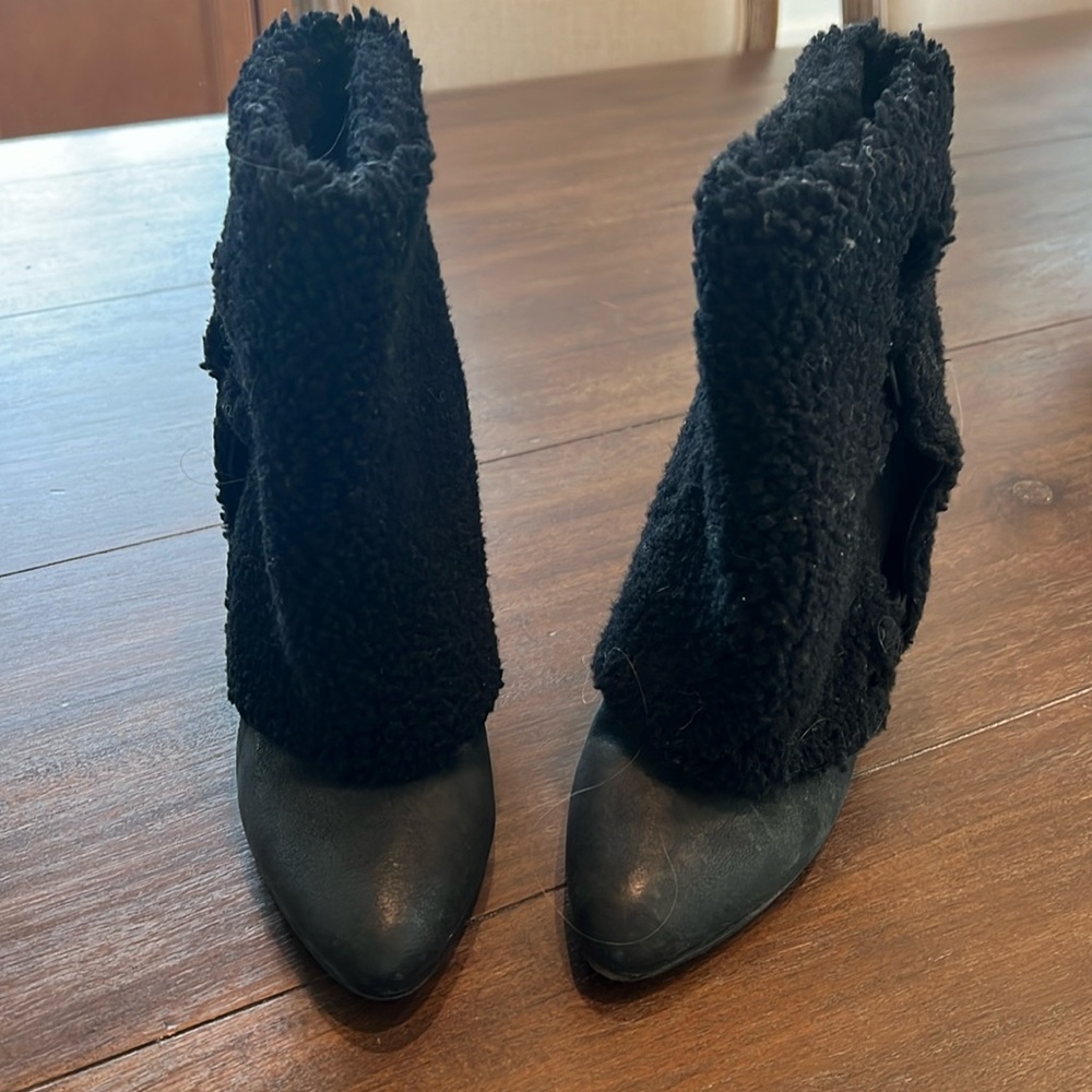 Sheep skin boots/booties. Worn high or folded over.